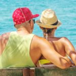 couple sitting on bench