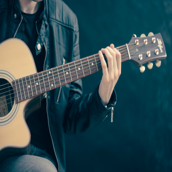 man playing guitar