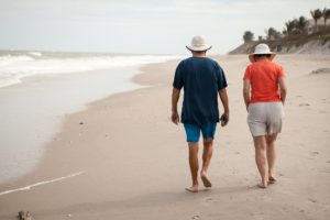 couple taking a walk on the beach